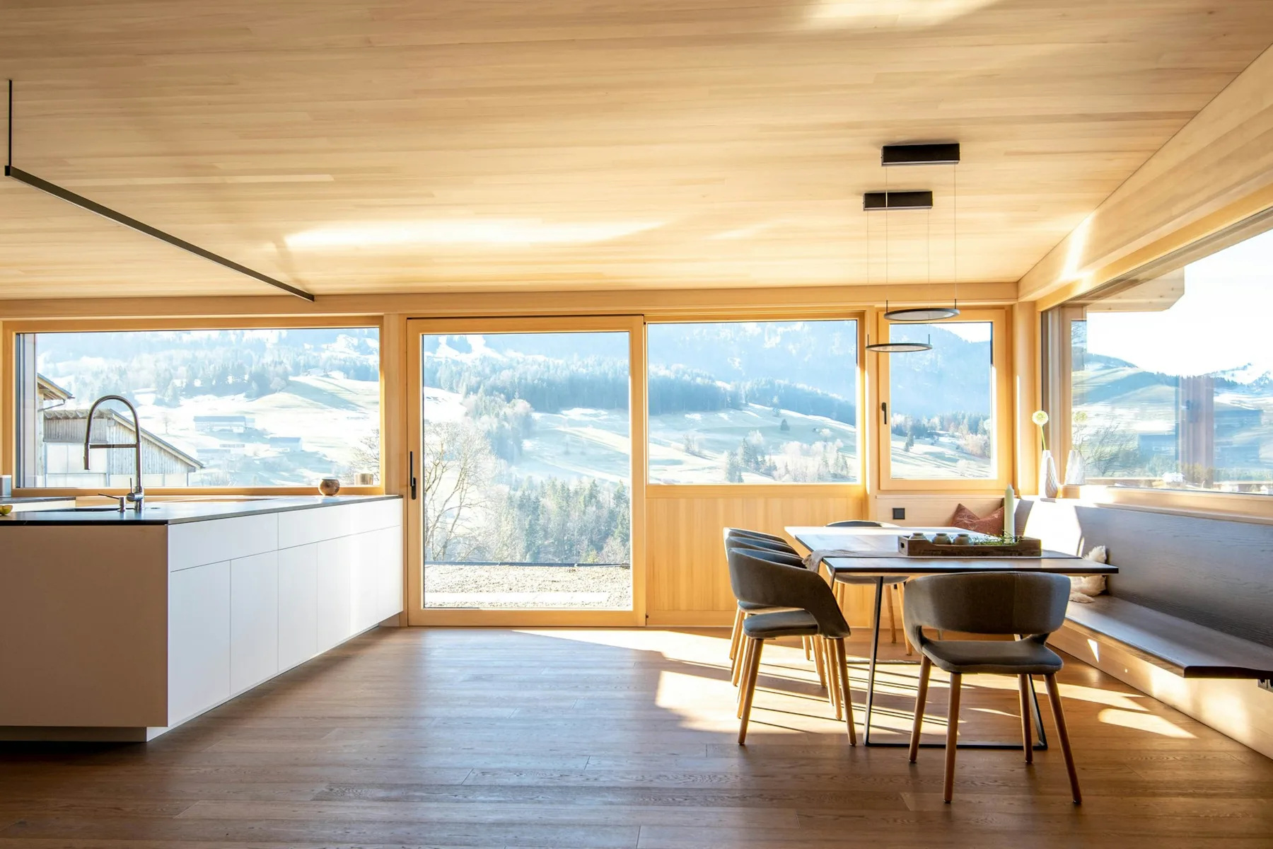Bright timber kitchen with a long window